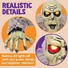 Halloween zombi dekoráció villogó szemekkel, hanggal